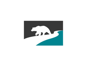 bear cub walking alone along creek river side as negative space inside two tone square logo
