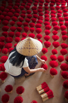 Asian woman making incense,handmade.