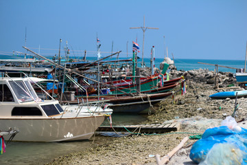 Beautiful Thai fishing boats on the pier