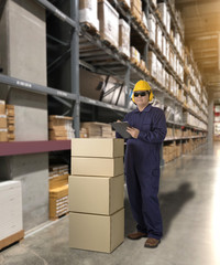 Fototapeta premium Worker in Mechanic Jumpsuit with holding parcel boxes