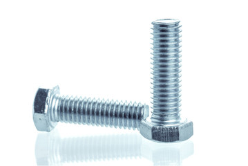 Closeup Bolts, steel screwbolts and nuts Used for capturing workpieces mechanical parts And construction isolated on a white background industrial concept