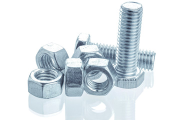 Closeup Bolts, steel screwbolts and nuts Used for capturing workpieces mechanical parts And construction isolated on a white background industrial concept