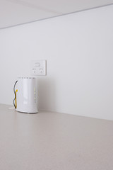 Modem against a white wall