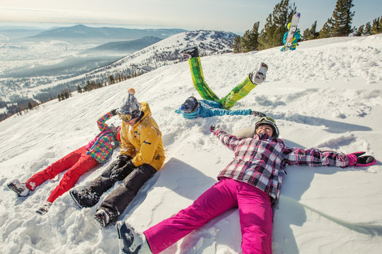 Snowboard people have fun in snow. Winter sport holiday mountains sky resort