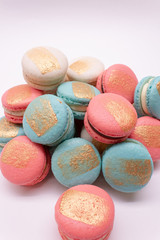 colorful macaroons on white background