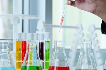 Chemical tube set development and pharmacy in laboratory  with multicolored substances in laboratory - Image