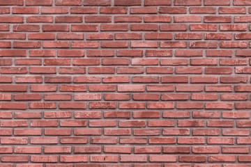 The background of the brick wall made from clay, arranged in a wall background