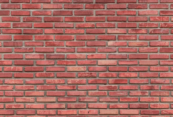 The background of the brick wall made from clay, arranged in a wall background