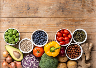 Healthy eating ingredients: fresh vegetables, fruits and superfood. Nutrition, diet, vegan food concept