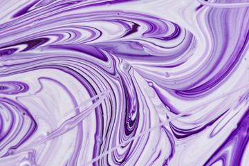 Abstract blank background for layouts. In the process of mixing purple and white paint obtained...