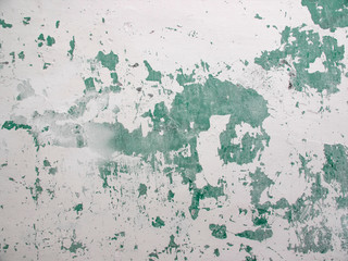 Old paint on a stone wall. Texture of old paint on the wall.