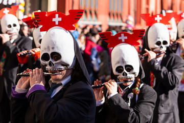 Basel carnival 2019 piccolo player with skull shaped mask - obrazy, fototapety, plakaty