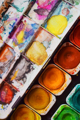 abstract texture of watercolors box with orange and green colors