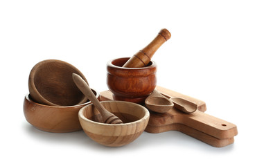 Wooden kitchen utensils on white background