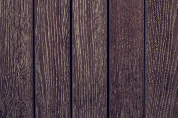 Texture of wooden boards from red tree. Pattern of redwood. Rustic wooden table of alder. Vintage maroon timber texture background. Space texture. Wood brown texture.
