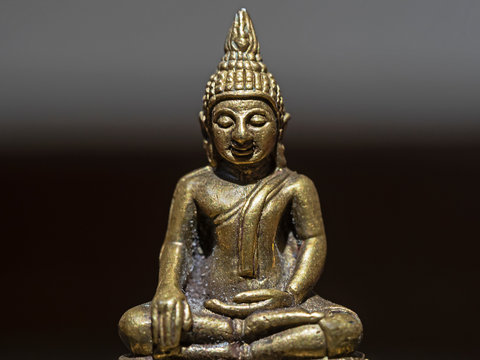 Close-up photography of a small buddha statue.