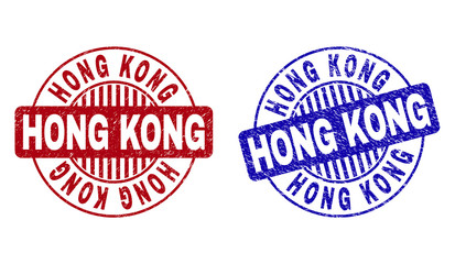 Grunge HONG KONG round stamp seals isolated on a white background. Round seals with grunge texture in red and blue colors. Vector rubber watermark of HONG KONG tag inside circle form with stripes.