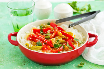 Baked bell peppers with rice noodles in Asian style.