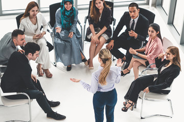 Businesswomen and businessmen attending group meeting conference in office room. Corporate business team concept.