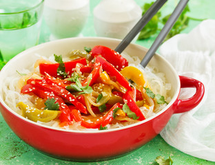 Baked bell peppers with rice noodles in Asian style.