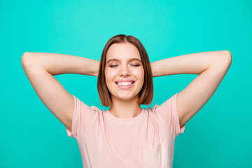 Portrait of cute charming lady youngster close eyes touch head back enjoy have weekdays holidays feel rejoice content isolated dressed pink fashionable shirts on turquoise background