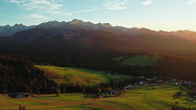 Epic sunset over Male Ciche village in Tatra mountains in Poland