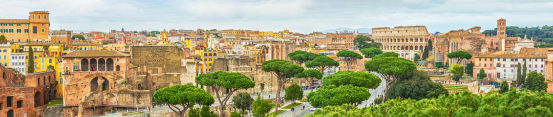 Fototapeta na wymiar Scenic shot of Rome with Colosseum and Roman Forum, Italy.