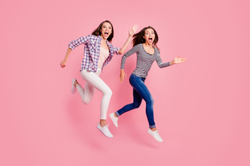 Quick Full length body size photo of funky satisfied enthusiastic teens teenagers have free time scream laugh carefree fool childish isolated wear fashionable clothes on pink background