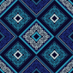 Ethnic boho seamless pattern. Embroidery on fabric. Patchwork texture. Weaving. Traditional ornament. Tribal pattern. Folk motif. Can be used for wallpaper, textile, invitation card, wrapping, web pag