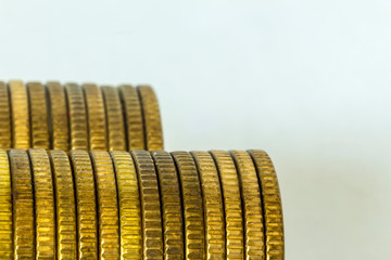 Makrofoto two stacks of coins. Stacks lying on their sides. Side view  . A good image for a site about finance, money, collection, relationships.
