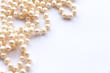pearl beads on a white background. copy space...