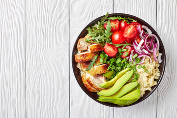 chicken bowl with couscous, greens and veggies