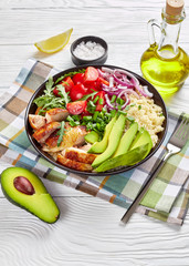 chicken bowl with couscous, greens and veggies