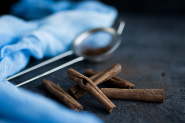 Cinnamon sticks on black background
