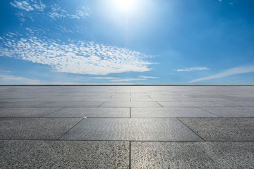 Empty floor and blue sky and white clouds scene