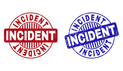 Grunge INCIDENT round stamp seals isolated on a white background. Round seals with grunge texture in red and blue colors. Vector rubber watermark of INCIDENT title inside circle form with stripes.