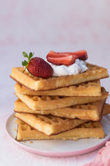 Homemade belgian Waffle. Strawberies and whiped cream.