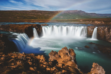 Obraz na płótnie Canvas The Godafoss (Icelandic: waterfall of the gods) is a famous waterfall in Iceland. The breathtaking landscape of Godafoss waterfall attracts tourist to visit the Northeastern Region of Iceland.
