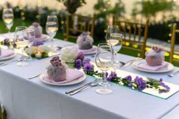 Table setting at a luxury wedding and Beautiful flowers on the table.