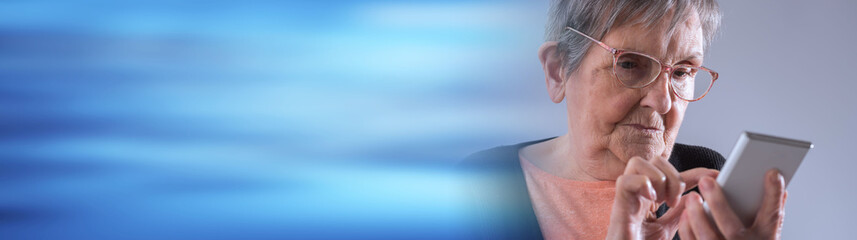 Senior woman and new technologies. panoramic banner