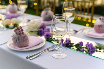 Table setting at a luxury wedding and Beautiful flowers on the table.