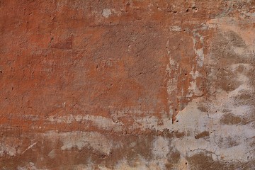 Old cracked ocher wall.