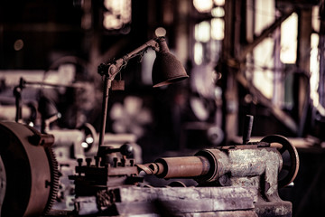 Old steel factory. Retro photography. Old factory industry. Photography. Metal pipes. Dark interior...