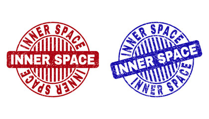 Grunge INNER SPACE round stamp seals isolated on a white background. Round seals with grunge texture in red and blue colors.