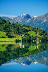 Fototapeta na wymiar Beautiful Nature Norway natural landscape with fjord and mountain.