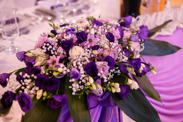 Beautiful purple flowers on table
