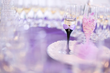 Glasses with champagne on table