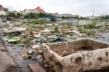 Polluted river fill with trash