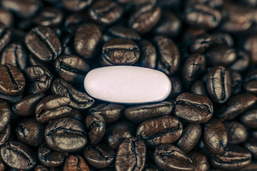Caffeine Supplement Pill and Coffee Beans
