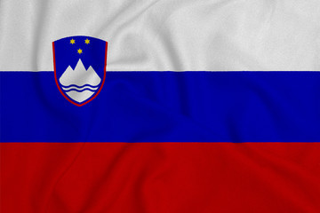 Flag of the Slovenia from the factory knitted fabric. Backgrounds and Textures